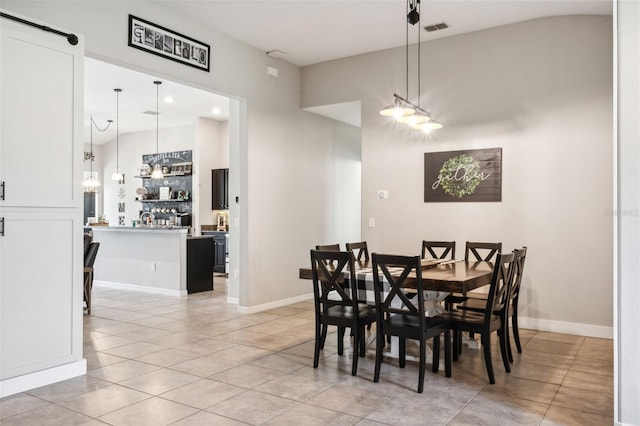 dining space with light tile patterned flooring