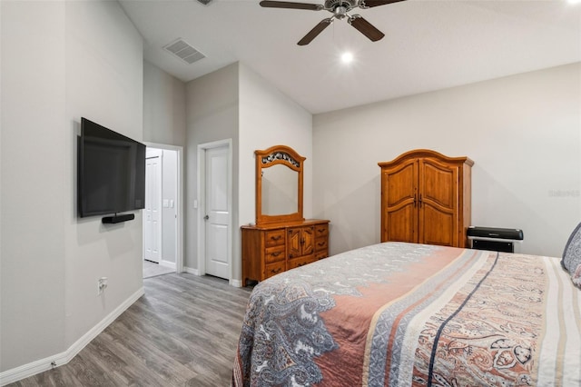 bedroom featuring hardwood / wood-style floors and ceiling fan