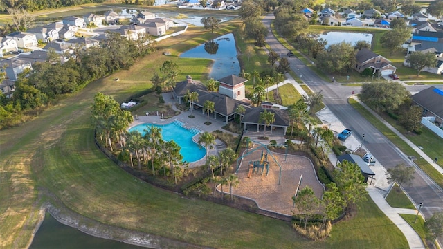 bird's eye view with a water view