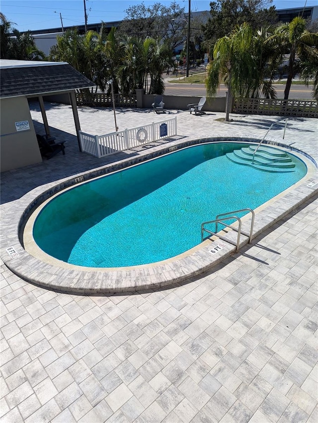 view of pool featuring a patio