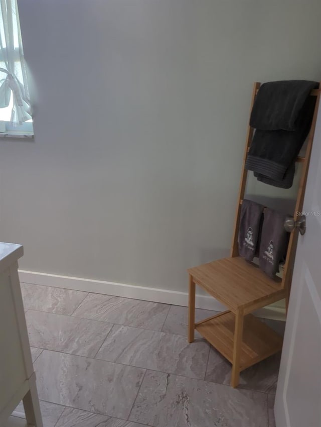 bathroom featuring baseboards