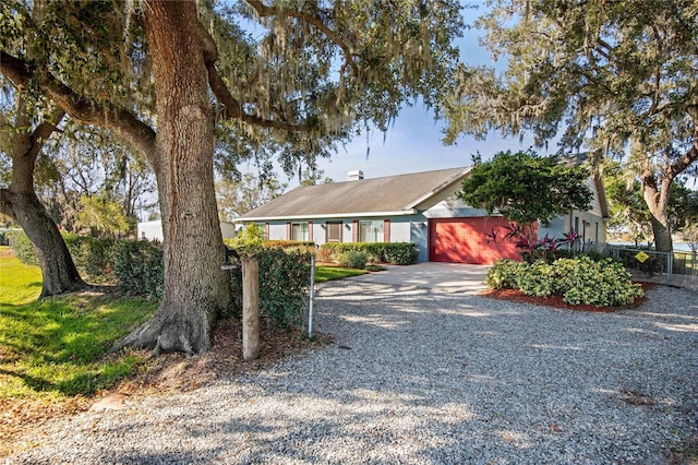 ranch-style home with a garage