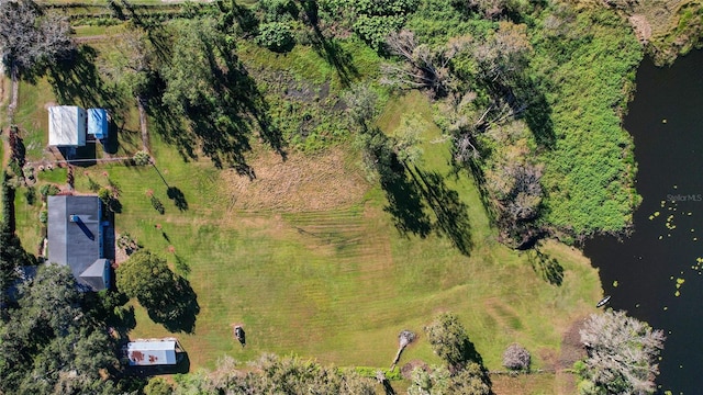 birds eye view of property featuring a rural view