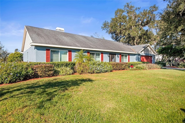 ranch-style home with a front yard