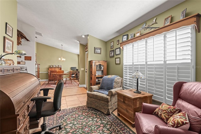 office area featuring a textured ceiling, light tile patterned floors, vaulted ceiling, and a notable chandelier