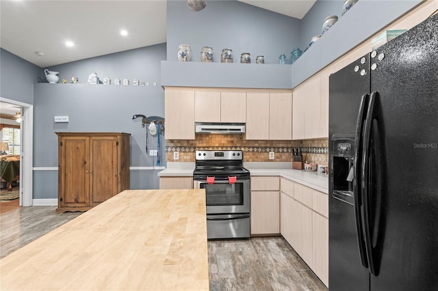 kitchen with black fridge with ice dispenser, electric range, butcher block counters, and hardwood / wood-style floors