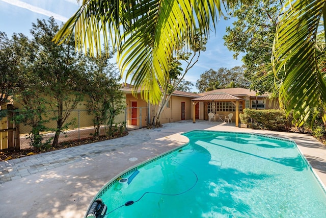 view of pool with a gazebo and a patio area