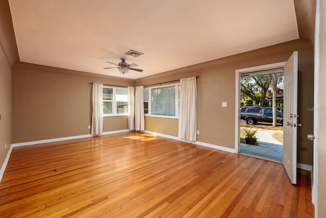 unfurnished room featuring ceiling fan and light hardwood / wood-style floors