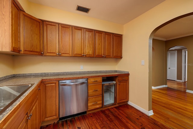 kitchen featuring sink, dark wood-type flooring, beverage cooler, stainless steel dishwasher, and crown molding