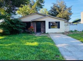 view of front of home with a front yard