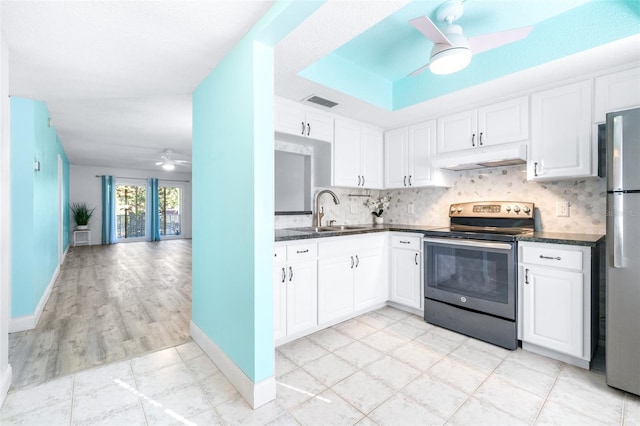 kitchen with ceiling fan, white cabinetry, sink, and appliances with stainless steel finishes