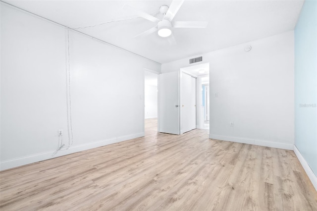 unfurnished room with ceiling fan and light hardwood / wood-style floors