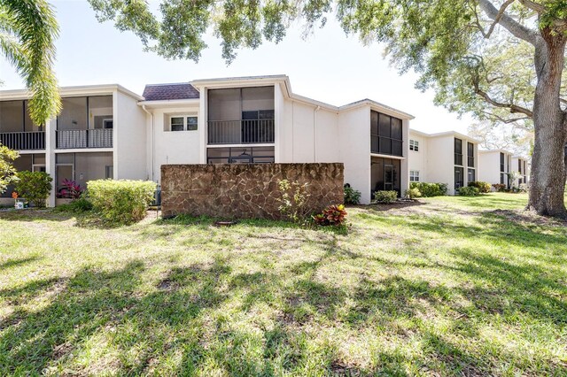 exterior space featuring a front lawn