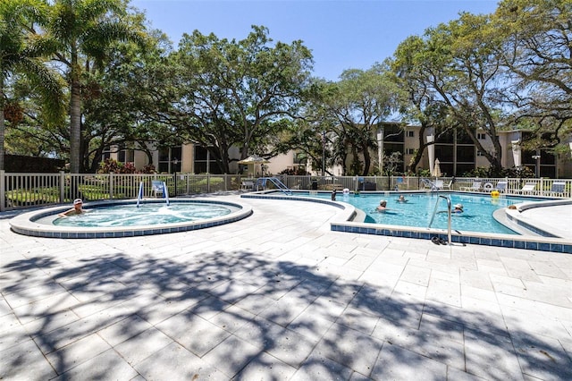 820 Patricia Ave Unit 207, Dunedin, FL 34698 - community pool featuring a patio