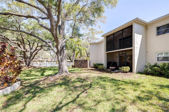 820 Patricia Ave Unit 207, Dunedin, FL 34698 - view of yard with a sunroom