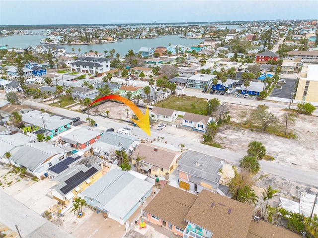 78 146th Ave E, Madeira Beach, FL 33708 - aerial view of residential area featuring a nearby body of water