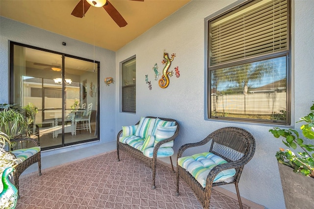 view of patio / terrace featuring ceiling fan