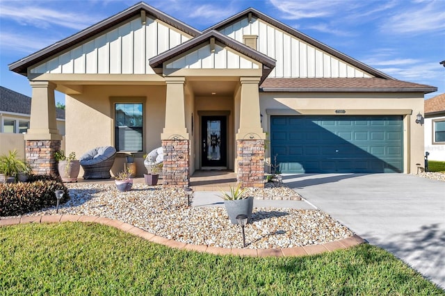 view of front of house featuring a porch and a garage