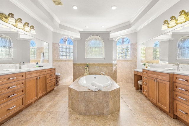 bathroom featuring tile patterned flooring, vanity, and crown molding