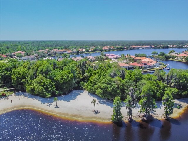 bird's eye view with a water view and a view of the beach