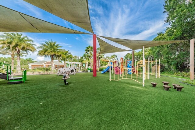 view of jungle gym featuring a yard