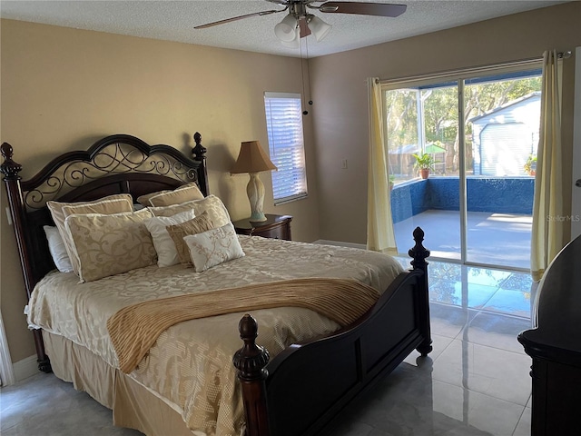 bedroom with access to exterior, a textured ceiling, tile patterned floors, and ceiling fan