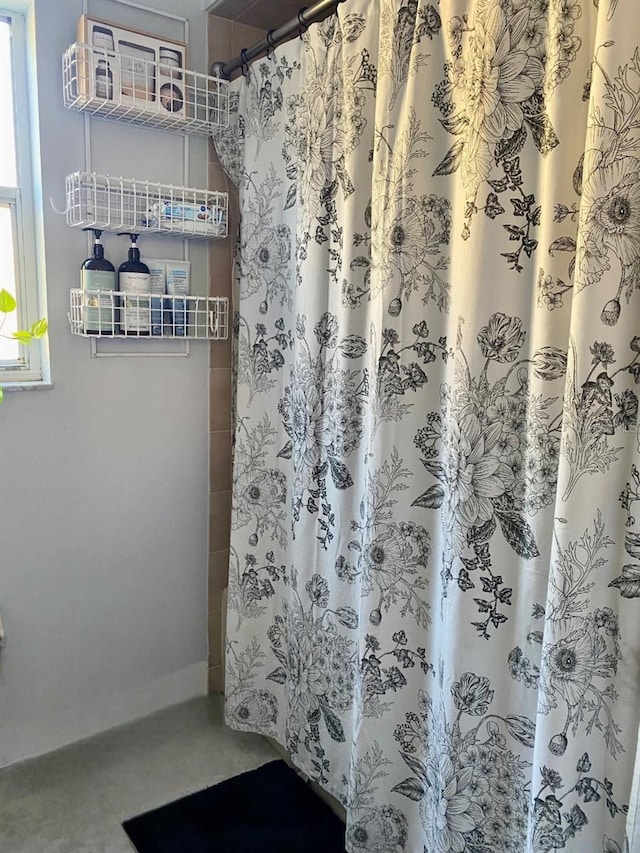 full bath with a shower with curtain