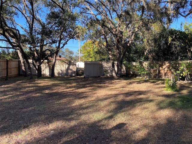 view of yard with fence