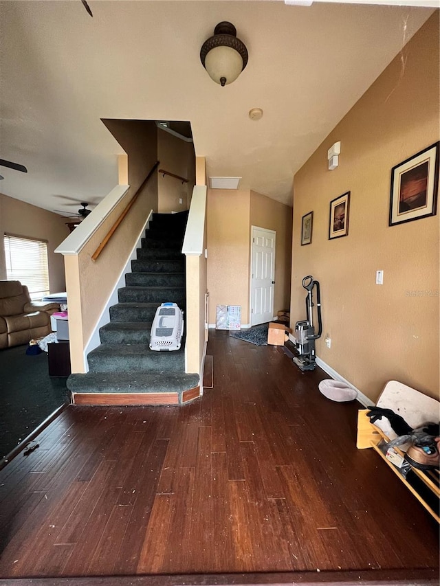 13404 Hampton Park Ct, Fort Myers, FL 33913 - staircase with wood-type flooring, vaulted ceiling, and a ceiling fan