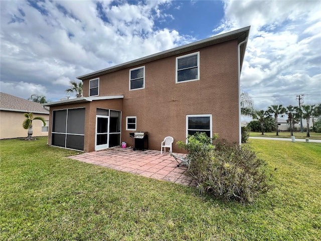 13404 Hampton Park Ct, Fort Myers, FL 33913 - back of house featuring a patio area, stucco siding, a lawn, and a sunroom