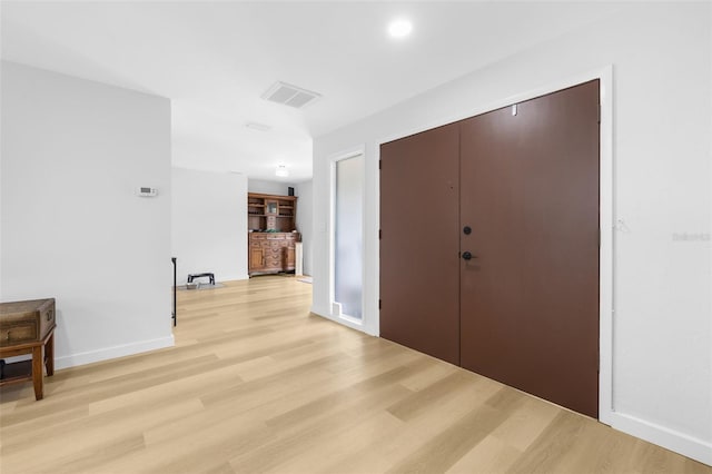 hall featuring light hardwood / wood-style flooring