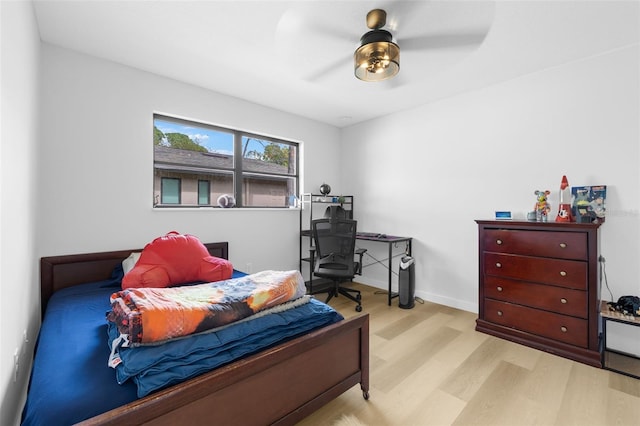 bedroom featuring ceiling fan and light hardwood / wood-style floors