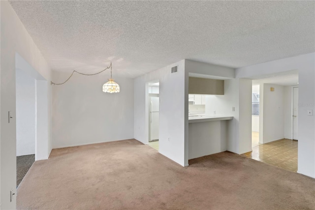 interior space with a textured ceiling