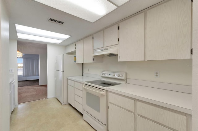 kitchen featuring white appliances