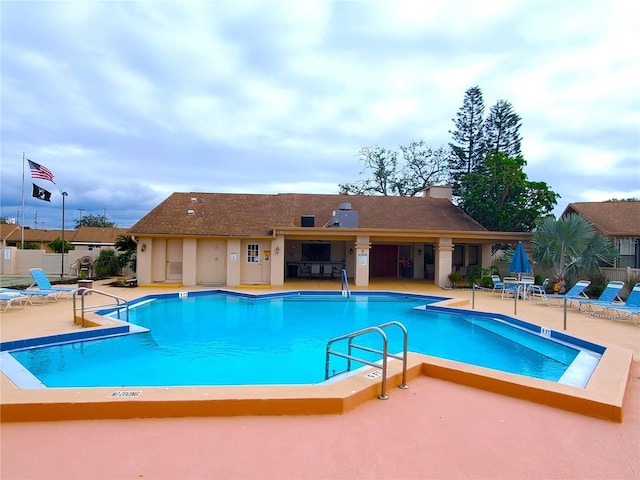 view of pool with a patio