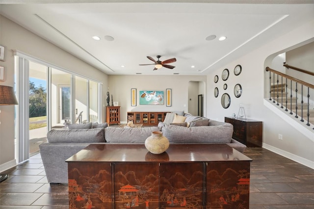 living room featuring ceiling fan