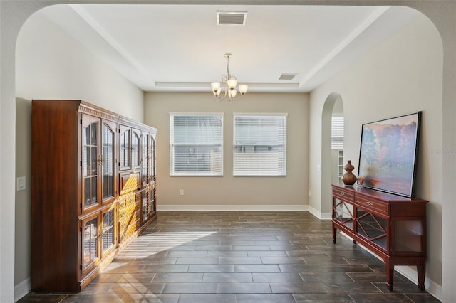 dining area featuring a chandelier