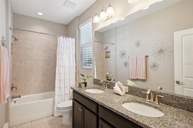 full bathroom with tile patterned flooring, vanity, shower / tub combo with curtain, and toilet