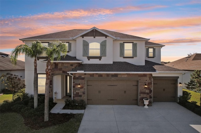 view of front of house with a garage