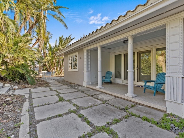35 Juniper Way, Clearwater Beach, FL 33767 - view of covered porch