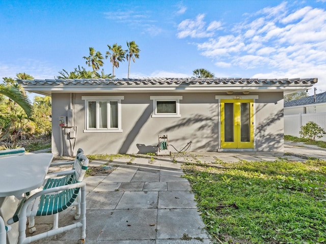 rear view of house featuring a patio area