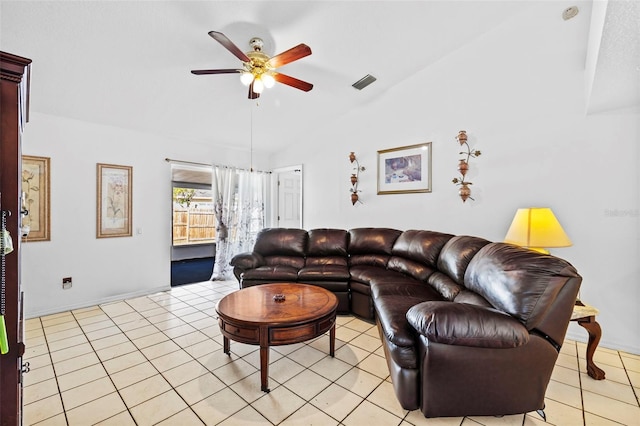 tiled living room featuring ceiling fan and lofted ceiling