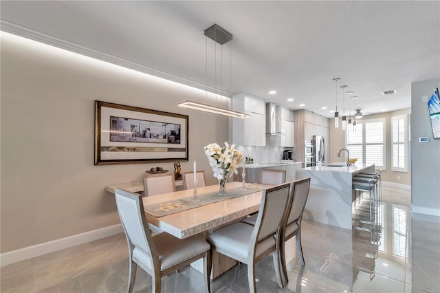 dining space with sink