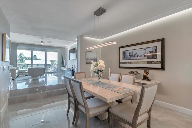 dining area with ceiling fan and light tile patterned floors