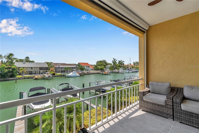 balcony featuring a water view