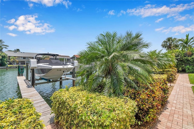 view of dock with a water view