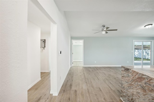 2537 Martha Ln, Land O Lakes, FL 34639 - empty room featuring light wood-style flooring, ceiling fan, and baseboards