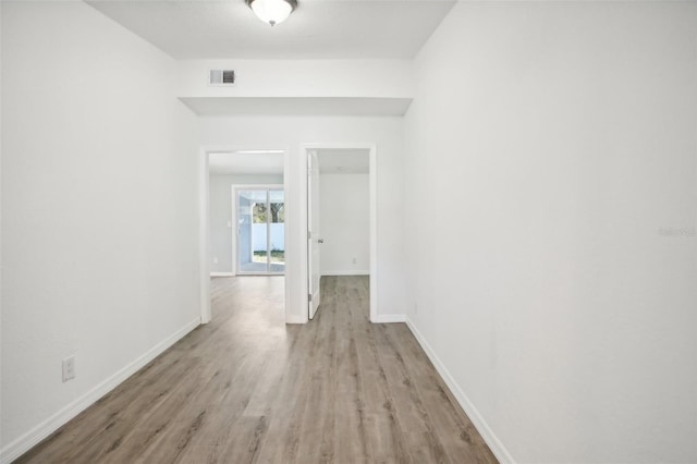 empty room with light wood-type flooring