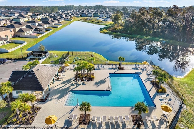 exterior space featuring a water view and a residential view