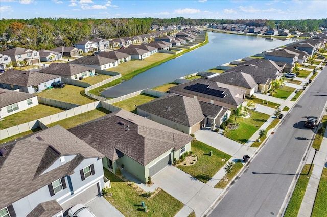 aerial view featuring a residential view and a water view